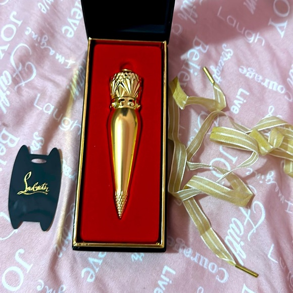 Christian Louboutin Other - Use once , red orange shade